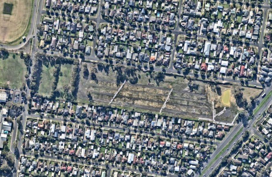 Nearmap image of 1 Henry Street, Belmont showing an empty lot within a community in Victoria which formally housed the CSIRO.