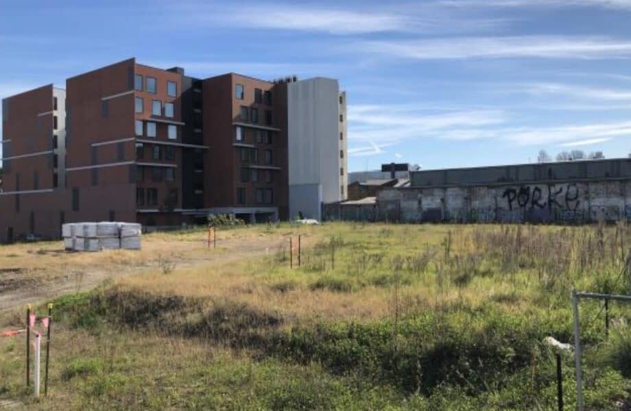 The vacant site where City West Housing plans to build the Acacia Apartments, a project with 275 affordable rental apartments in Green Square Town Centre.