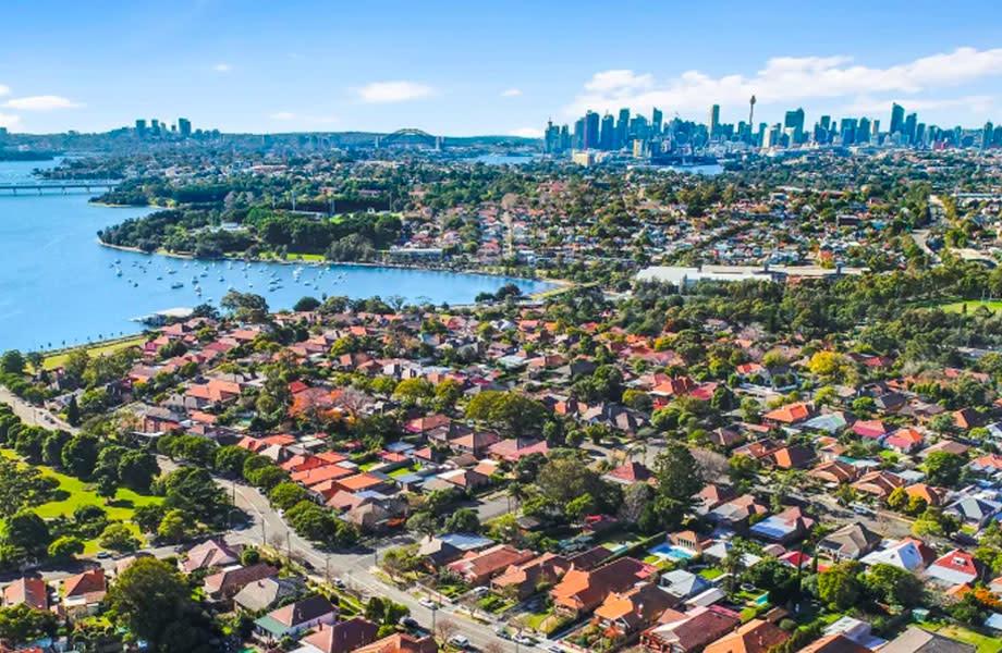 Sydney, Melbourne Brace for Price Falls as Rate Rise Looms