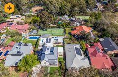 big houses with tennis courts somewhere in australia.