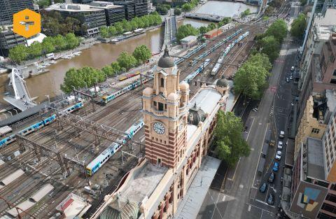An aerial shot of Flinders Street Station and the Flinders Street Viaduct that carries train lines through to Southern Cross Station.